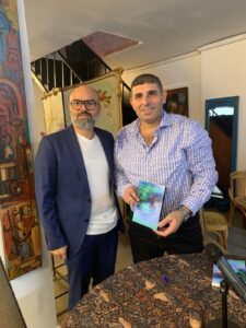 الفري خلال مشاركته قبل عامين في التوقيع الاول لمجموعتي الشعرية الاولى موانىء الفيروز في ملتقى "خيرات الزين" في قريطم