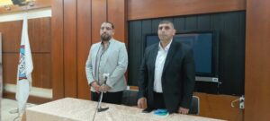 علي ضاحي وعبد الحليم حمود خلال التوقيع الثاني لموانىء الفيروز في الرابطة الثقافية في طرابلس