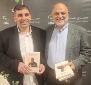 قصير وضاحي خلال التوقيع